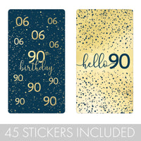 Small candy bar wrappers decorated with navy blue and gold colors and hello 90