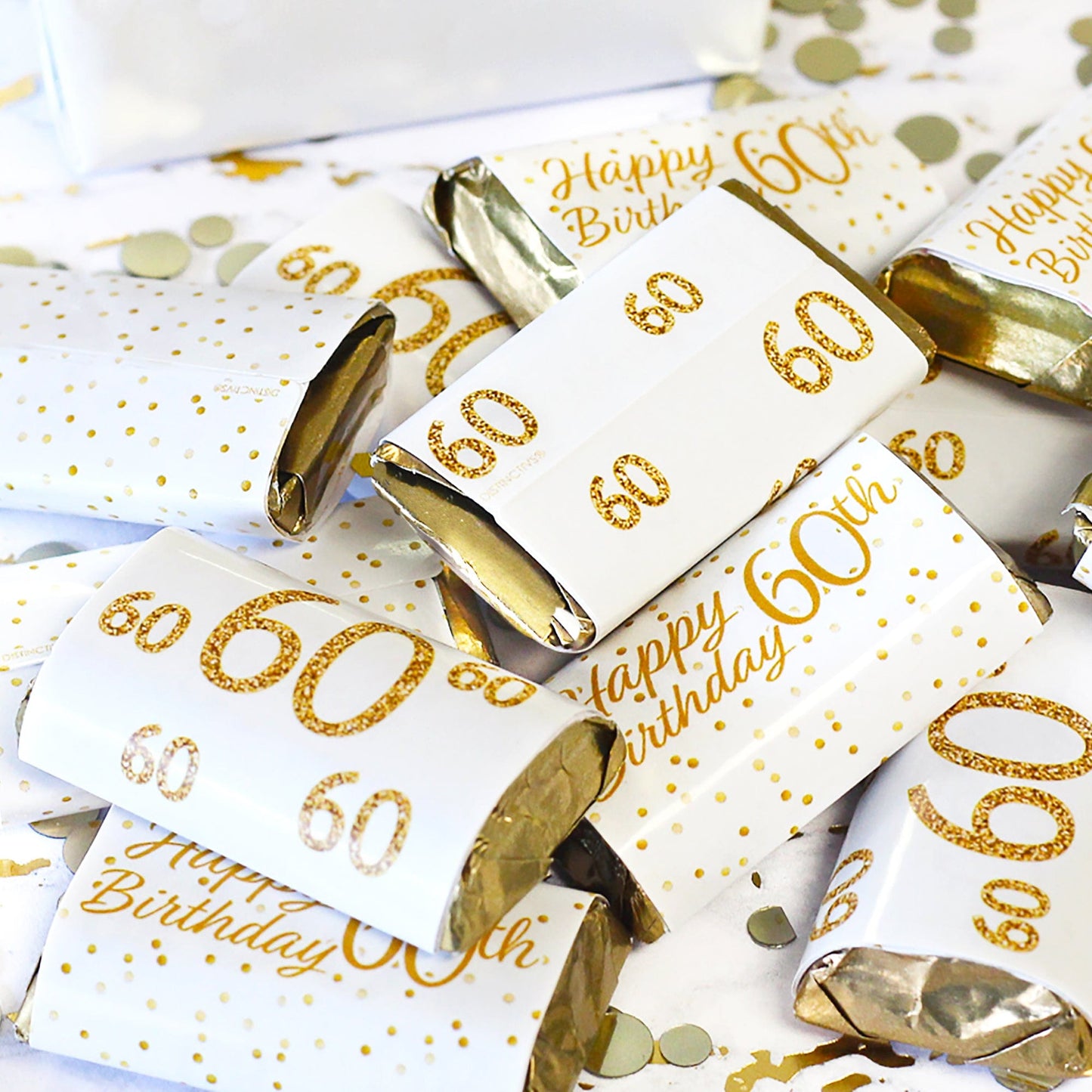 Dress up your 60th birthday party decorations with these white and gold mini candy bar stickers. 